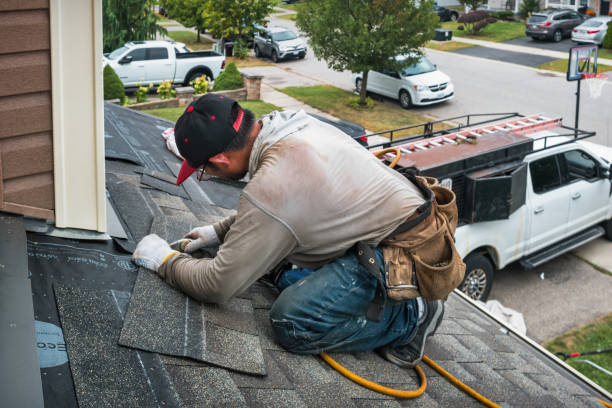Professional Gutter Installation technician working in Woodland, WA